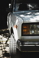 Image showing Sensual model posing on car