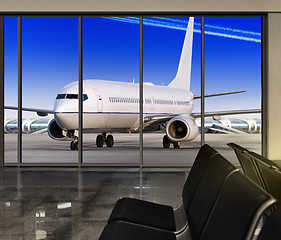 Image showing window in airport at sun day