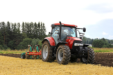 Image showing Case IH Tractor and Plow Working on Field