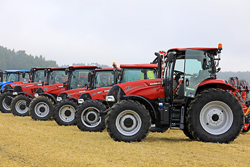 Image showing Case IH Agricultural Tractors in a Row