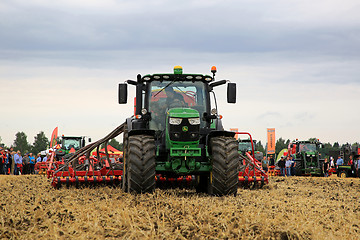 Image showing Work with John Deere Tractor and Vaderstad Seed Drill 