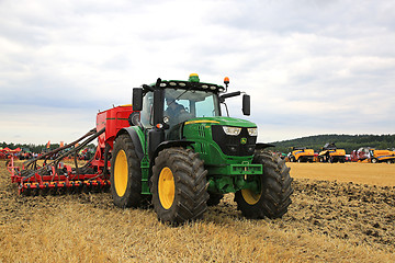 Image showing John Deere 6155R Tractor and Vaderstad Seed Drill on Field