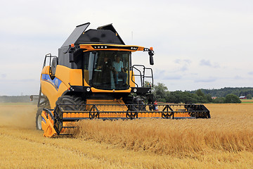 Image showing New Holland CX 5.80 RS Combine Harvests Barley