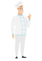 Image showing Smiling chef cook showing ok sign.