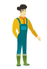 Image showing Asian farmer with hand in his pocket.