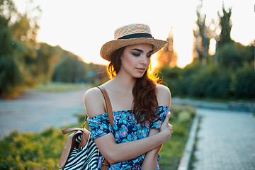 Image showing Attractive young woman enjoying her time outside in park