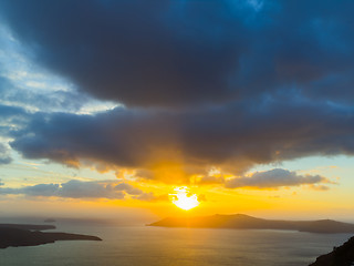 Image showing A sunset at Fira town, with view of caldera, volcano