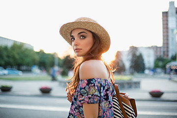 Image showing The fashion woman portrait of young pretty trendy girl posing at the city in Europe