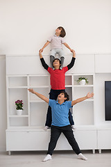 Image showing young boys posing line up piggyback