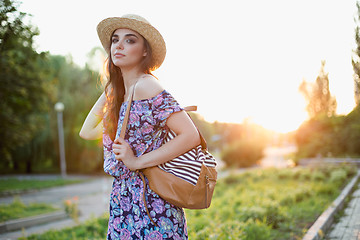 Image showing Attractive young woman enjoying her time outside in park