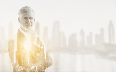 Image showing Double exposure of senior businessman