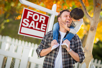 Image showing Young Mixed Race Chinese and Caucasian Father and Son In Front o