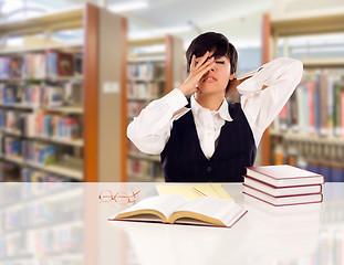 Image showing Young Female Mixed Race Student Stressed and Frustrated In Libra