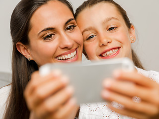 Image showing Mom and Daughter at home