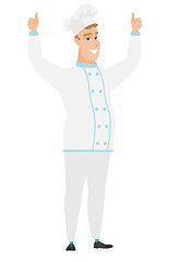 Image showing Chef cook standing with raised arms up.