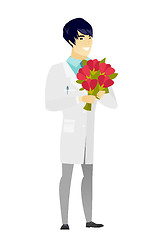 Image showing Asian doctor holding a bouquet of flowers