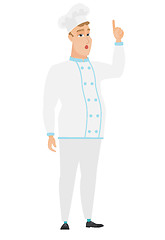 Image showing Chef cook with open mouth pointing finger up.