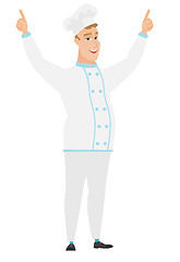 Image showing Chef cook standing with raised arms up.