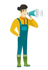 Image showing Asian farmer talking into loudspeaker.