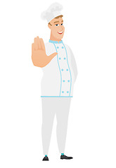 Image showing Caucasian chef cook showing palm hand.