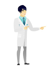 Image showing Young asian doctor pointing to the side.