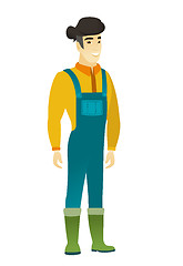 Image showing Young asian confident farmer in coveralls.