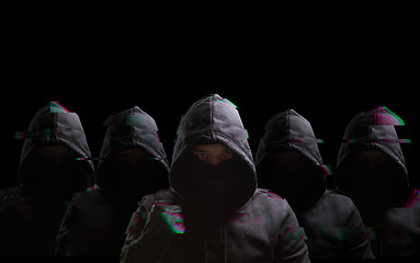 Image showing Many anonymous on black background