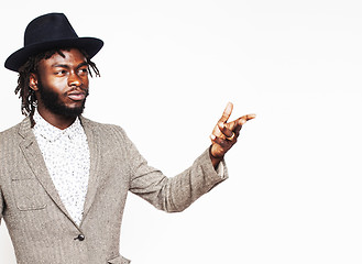 Image showing young handsome afro american boy in stylish hipster hat gesturing emotional isolated on white background smiling, lifestyle people concept