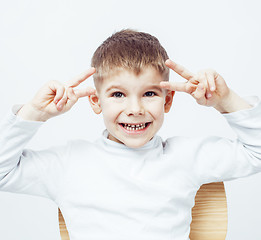 Image showing little cute adorable boy posing gesturing cheerful on white background, lifestyle people concept 