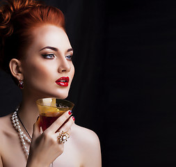 Image showing beauty stylish redhead woman with hairstyle wearing jewelry