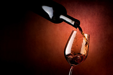 Image showing Wineglass on a brown background