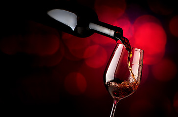 Image showing Wineglass on a vinous background