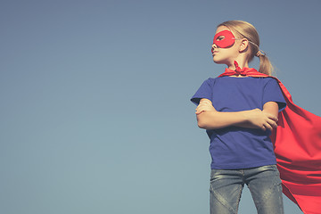 Image showing Happy little child playing superhero.