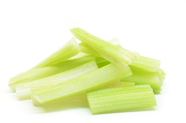 Image showing Cutting fresh bunch of celery