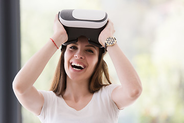 Image showing woman using VR-headset glasses of virtual reality