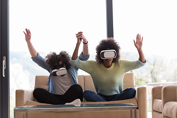 Image showing Multiethnic Couple using virtual reality headset