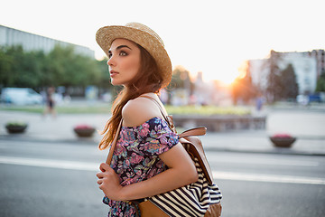 Image showing The fashion woman portrait of young pretty trendy girl posing at the city in Europe