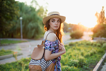 Image showing Attractive young woman enjoying her time outside in park