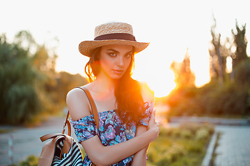 Image showing Attractive young woman enjoying her time outside in park