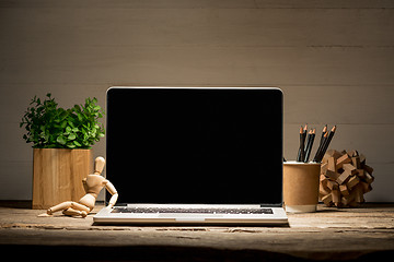 Image showing The front view of notebook and cup of coffee. Inspiration and mock-up concept