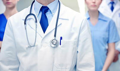 Image showing close up of medics or doctors at hospital