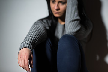 Image showing sad crying woman suffering from domestic violence