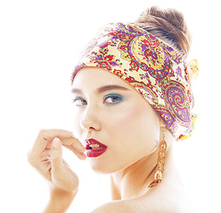 Image showing young pretty modern girl with bright shawl on head emotional posing isolated on white background, asian people ethnicity