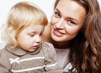 Image showing young pretty stylish mother with little cute blond daughter hugging, happy smiling real family, lifestyle people concept