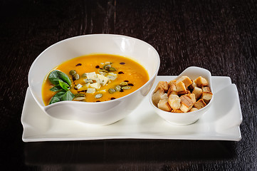 Image showing Pumpkin and soup with cream and pumpkin seeds