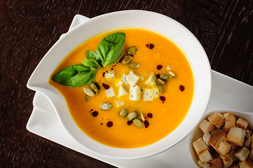 Image showing Pumpkin and soup with cream and pumpkin seeds