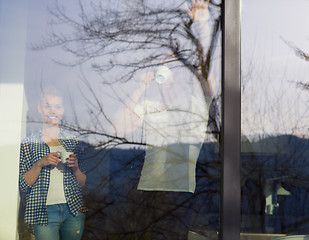 Image showing young couple enjoying morning coffee