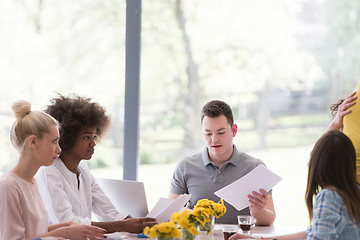 Image showing Multiethnic startup business team on meeting