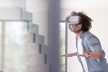 Image showing man using VR-headset glasses of virtual reality