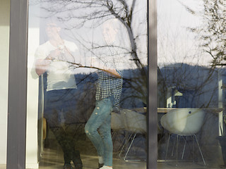 Image showing young couple enjoying morning coffee